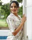 actress-nikhila-vimal-new-photos-in-white-floral-printed-saree-with-blouse-001