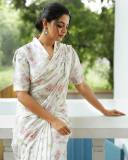actress-nikhila-vimal-new-photos-in-white-floral-printed-saree-with-blouse-003