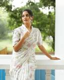 actress-nikhila-vimal-new-photos-in-white-floral-printed-saree-with-blouse-004