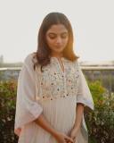 nikhila-vimal-in-white-aline-anarkali-dress-photos-002
