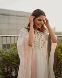 nikhila-vimal-in-white-aline-anarkali-dress-photos