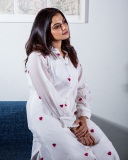 nikhila-vimal-in-white-kurta-with-love-symbol-design-set-dress-photos-007