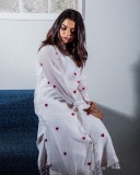 nikhila-vimal-in-white-kurta-with-love-symbol-design-set-dress-photos-008