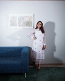nikhila-vimal-in-white-kurta-with-love-symbol-design-set-dress-photos-009