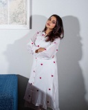 nikhila-vimal-in-white-kurta-with-love-symbol-design-set-dress-photos-010
