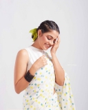 nikhila-vimal-in-white-saree-with-sleeveless-blouse-001