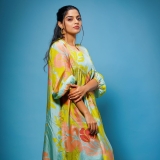 nikhila-vimal-new-photoshoot-in-yellow-dress