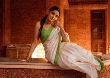 nikhila-vimal-new-pic-in-kerala-saree-with-light-green-border-and-blouse-002