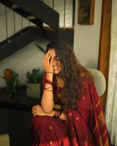nimisha-sajayan-in-kumkum-red-pattu-saree-photos-005