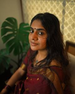 nimisha-sajayan-in-kumkum-red-pattu-saree-photos-011
