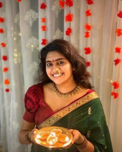 nimisha-sajayan-new-photoshoot-in-green-saree-001