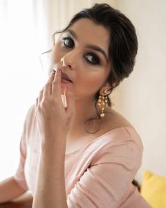 niranjana-anoop-in-peach-colour-dress-photos-003
