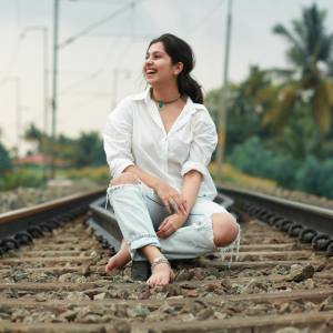 niranjana-anoop-in-white-shirt-and-jeans-photos