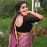 niranjana-anoop-in-violet-saree-with-black-blouse-photos