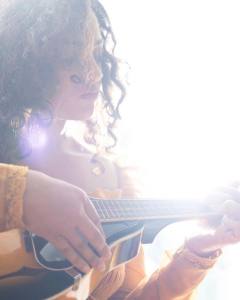 nithya-menon-with-guitar-images-002