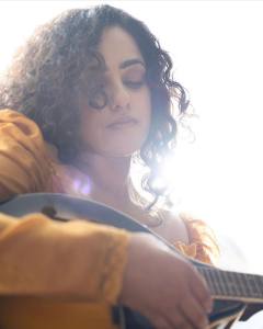 nithya-menon-with-guitar-images