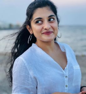 nivetha-thomas-new-photos-in-white-shirt-001