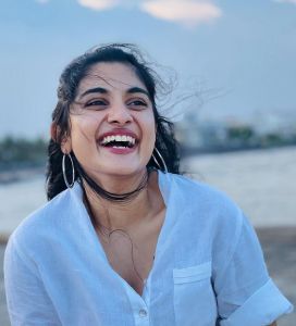 nivetha-thomas-new-photos-in-white-shirt-002