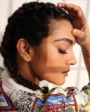 parvathy-thiruvothu-in-multi-colour-coat-with-pink-inner-dress-photos-005