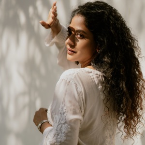 poornima-indrajith-in-white-colour-dress-ideas-photos