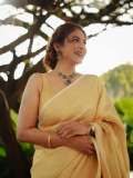 poornima-indrajith-in-saree-with-stylish-hairstyles-photos-011