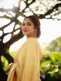 poornima-indrajith-in-saree-with-stylish-hairstyles-photos-012