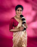 poornima-indrajith-in-traditional-saree-with-maroon-blouse-images-latest