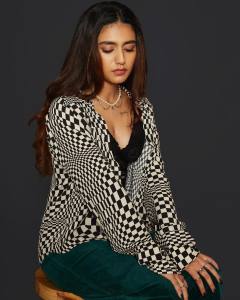 priya-varrier-in-black-shrug-and-glass-photo-001