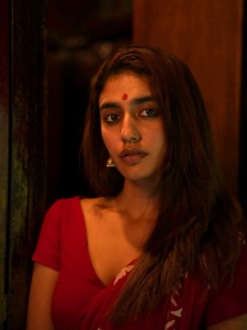 priya-varrier-in-maroon-chungidi-saree-photos