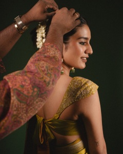 priya-varrier-in-mustard-yellow-hue-with-a-glossy-silk-saree-heavily-embellished-sleeveless-corset-or-bustier-style-blouse-ideas-photos-007