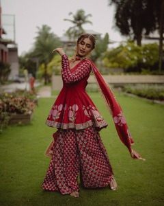 priya-varrier-in-wine-red-party-wear-dress-photos-007