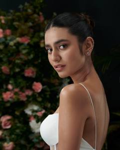 priya-varrier-new-photo-shoot-in-white-spaghetti-strap-dress-003