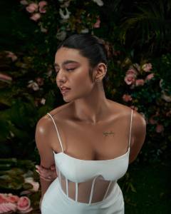 priya-varrier-new-photo-shoot-in-white-spaghetti-strap-dress-008