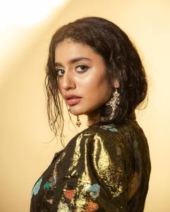 priya-varrier-new-pictures-in-Gold-colour-suit-003