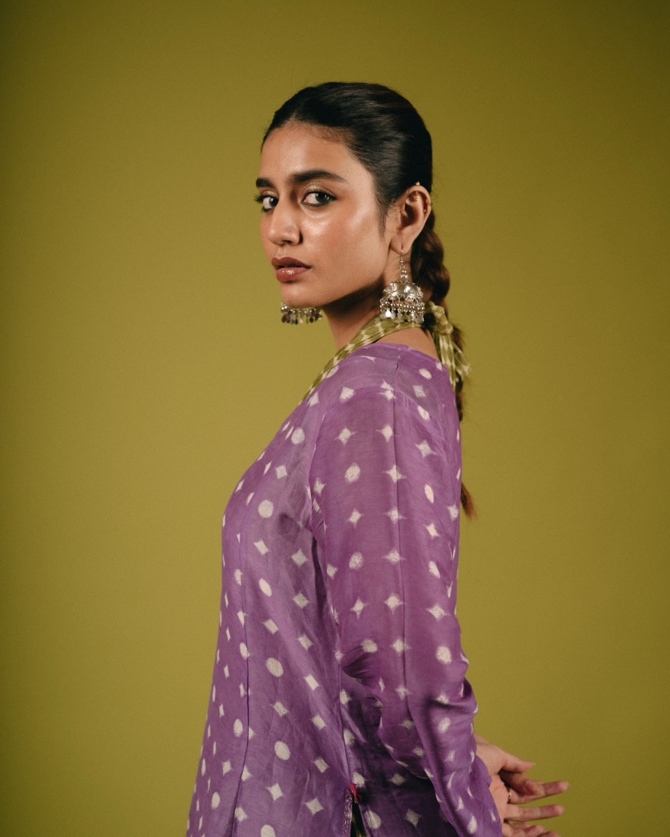 priya-varrier-in-violet-long-length-top-with-palazzo-pants-outfit-photos-003
