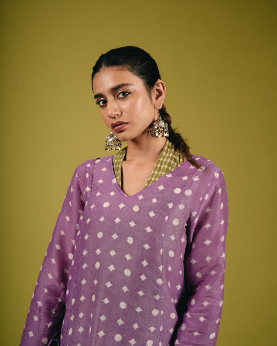 priya-varrier-in-violet-long-length-top-with-palazzo-pants-outfit-photos-009