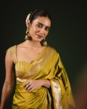 priya-varrier-in-mustard-yellow-hue-with-a-glossy-silk-saree-heavily-embellished-sleeveless-corset-or-bustier-style-blouse-ideas-photos-002