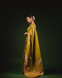 priya-varrier-in-mustard-yellow-hue-with-a-glossy-silk-saree-heavily-embellished-sleeveless-corset-or-bustier-style-blouse-ideas-photos-009