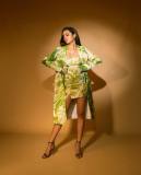 actress-priya-varrier-latest-pics-in-Green-Trench-Jacket-with-Short-Dress-003