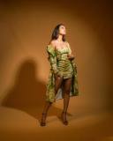 actress-priya-varrier-latest-pics-in-Green-Trench-Jacket-with-Short-Dress