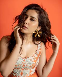 raashi-khanna-in-orange-full-length-dress-003