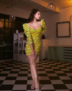 raashi-khanna-new-photos-in-dot-print-yellow-short-top-001
