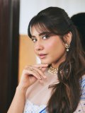 raashi-khanna-in-lightweight-sheer-white-fabric-saree-with-matching-sleeveless-blouse-with-a-sheer-mesh-illusion-neckline-photos-005