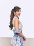 raashi-khanna-in-lightweight-sheer-white-fabric-saree-with-matching-sleeveless-blouse-with-a-sheer-mesh-illusion-neckline-photos