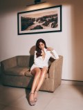raashi-khanna-in-structured-mini-length-blazer-dress-in-solid-off-white-eaturing-a-plunging-V-neckline-with-narrow-lapels-design-dress-photos-006