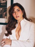 raashi-khanna-in-structured-mini-length-blazer-dress-in-solid-off-white-eaturing-a-plunging-V-neckline-with-narrow-lapels-design-dress-photos-008