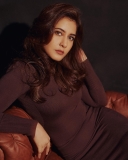 raashi-khanna-in-brown-knitted-long-sleeve-midi-dress-photos-003