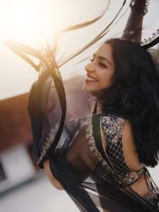 Actress-Rajisha-Vijayan-A-fitted-sleeveless-V-neck-crop-top-and-dark-Lehenga-photos-011