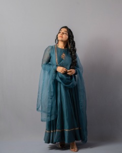 rajisha-vijayan-in-anarkali-suit-dress-for-wedding-function-photos-003