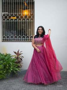 rajisha-vijayan-in-classic-three-piece-magenta-lehenga-set-sleeveless-cropped-blouse-with-intricate-floral-embroidery-photos-004